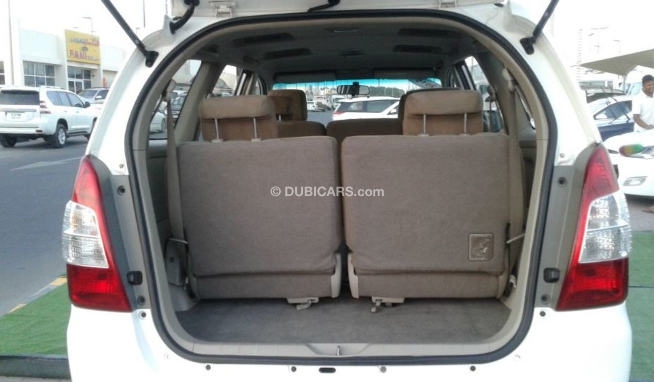 تويوتا إينوفا ابيض خليجى 2015 فتحة سقف رقم 1فل ابشن كامل بحالة جيدة