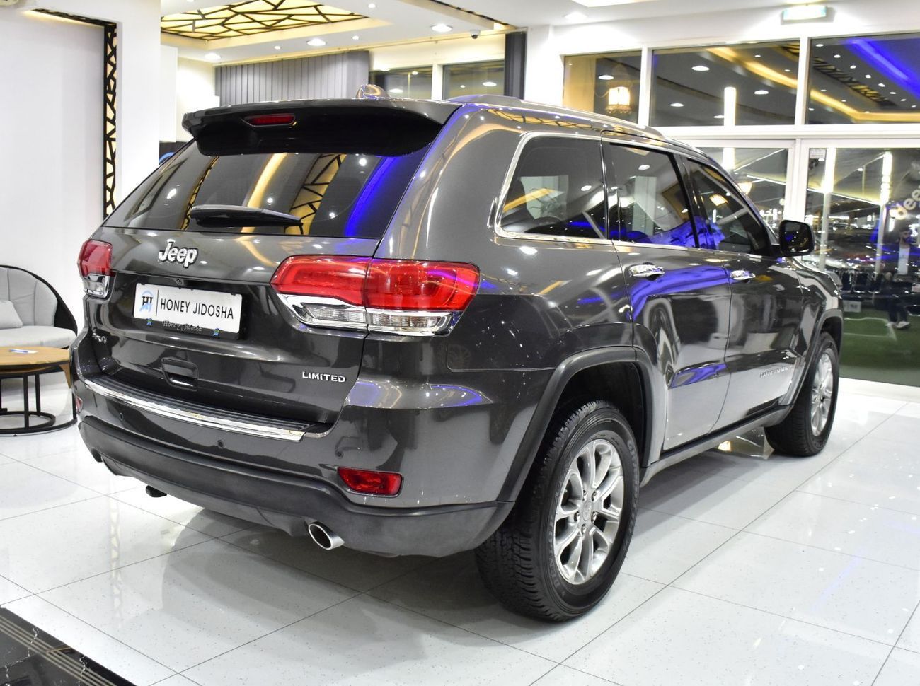 Jeep Grand Cherokee EXCELLENT DEAL for our Jeep Grand Cherokee Limited 4x4 ( 2015 Model ) in Grey Color GCC Specs