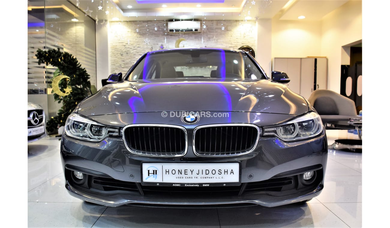 BMW 320i i 32000 KM ONLY 2016 Model in Grey color GCC SPECS