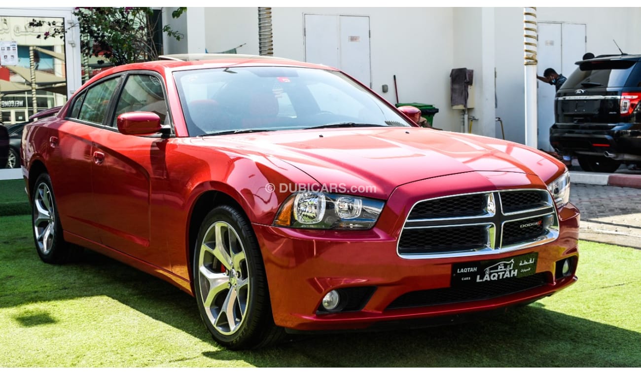 Dodge Charger Import - number one - hatch - leather - rear spoiler - cruise control - alloy wheels - sensors in ex
