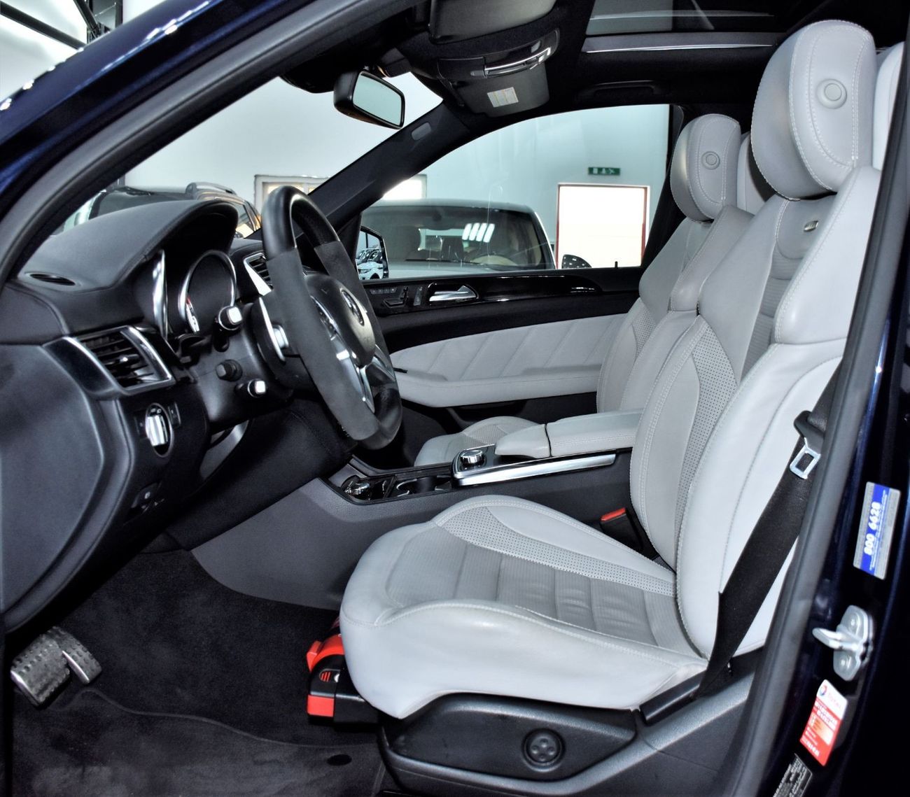 Mercedes-Benz ML 63 AMG EXCELLENT DEAL for our Mercedes Benz ML63 AMG ( 2013 Model ) in Dark Blue Color GCC Specs