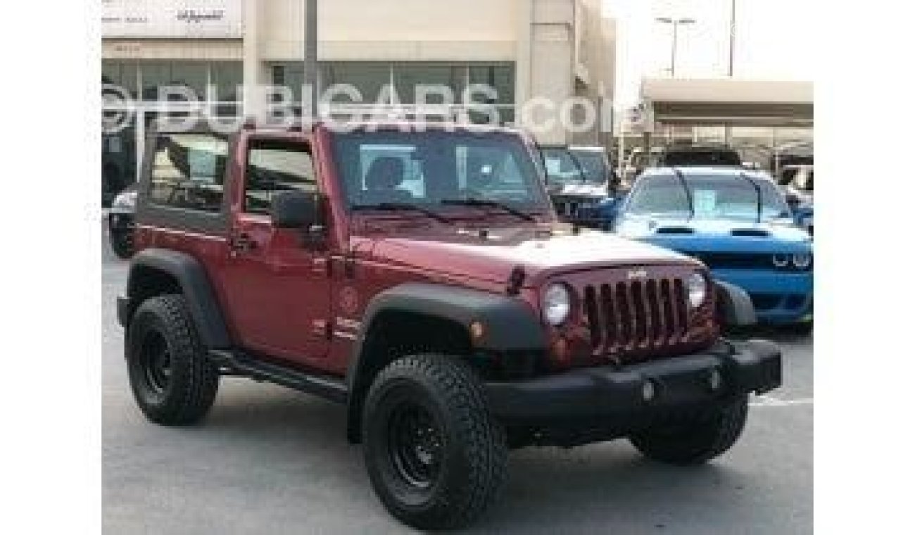 Jeep Wrangler Wrangler Sport 2012 model in excellent condition, inside and out