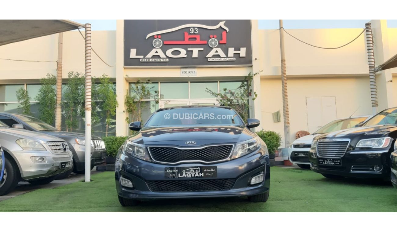 كيا أوبتيما خليجى رقم 2  شاشة   كاميرا  مثبت  سرعة  جناح خلفى رنجات حساسات أنوار ضباب بحالة ممتازة