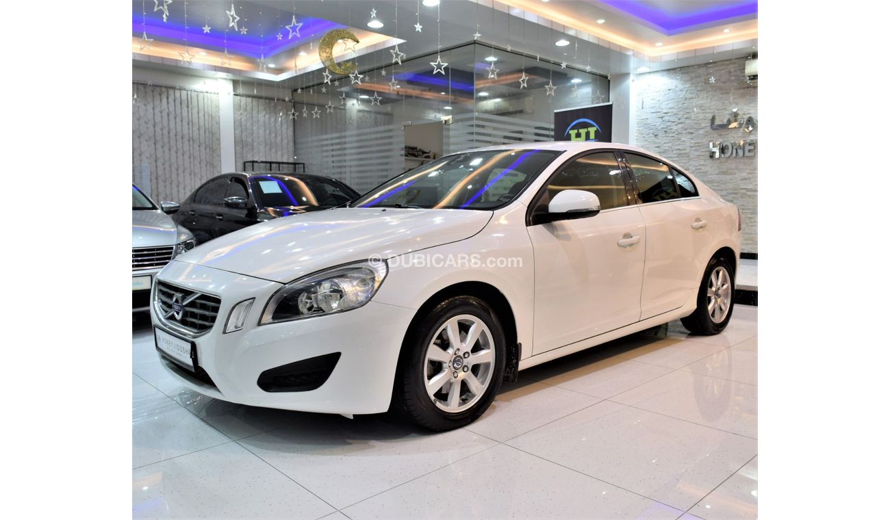 Volvo S60 EXCELLENT DEAL for our Volvo S60 ( 2012 Model! ) in White Color! GCC Specs