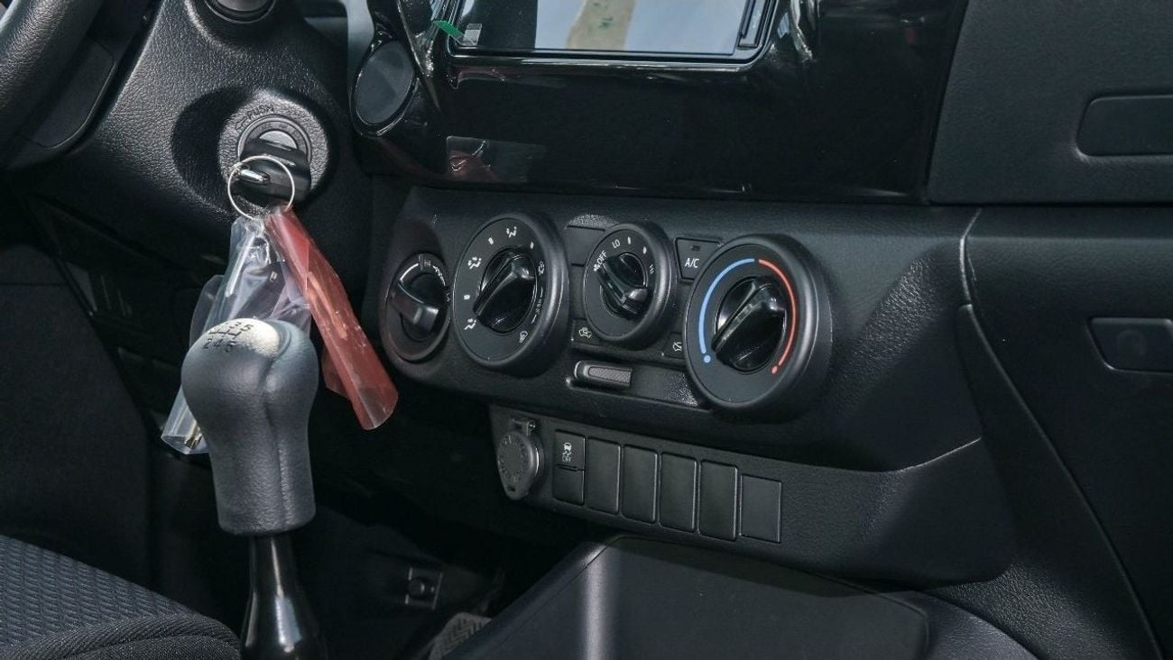 تويوتا هيلوكس DLX ECTJRY003 - 2026 Toyota Hilux Single Cab - 2.4L Diesel Manual 4wd - White with Red Interior