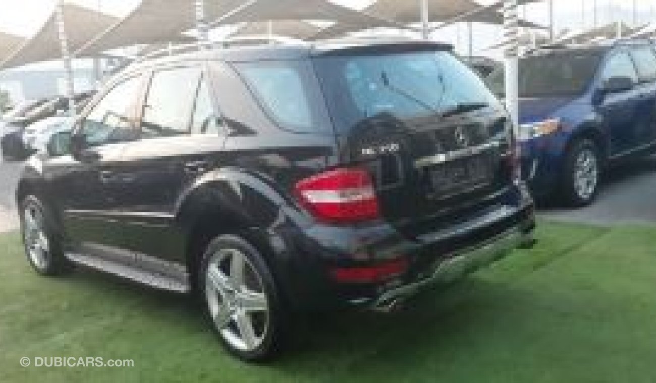 مرسيدس بنز ML 350 خليجى رقم واحد فتحة جلد رنجات حساسات خشب بصمة رنجات حساسات مثبت سرعة تحكم جناح خلفى بحالة ممتازة