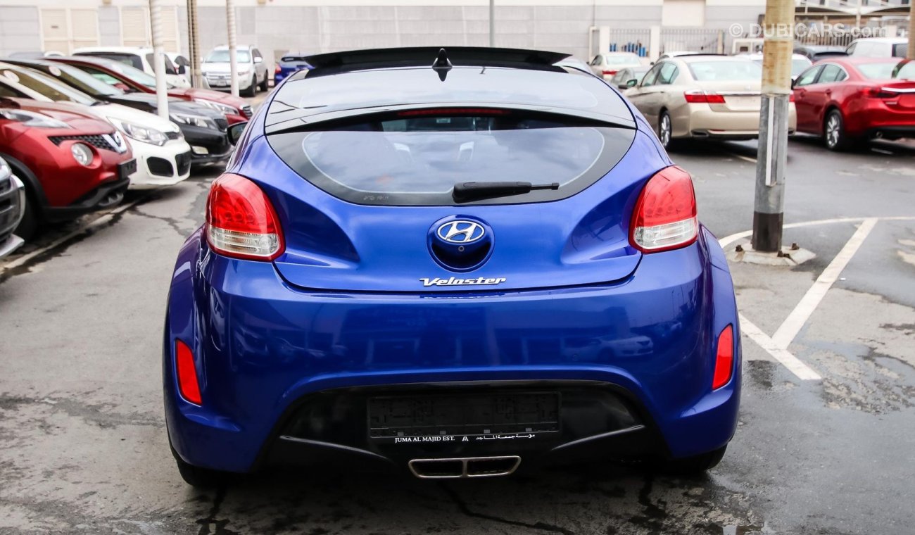 Hyundai Veloster Pre-owned for sale in Sharjah. Blue 2015 model, available at Wael Al Azzazi Sharjah