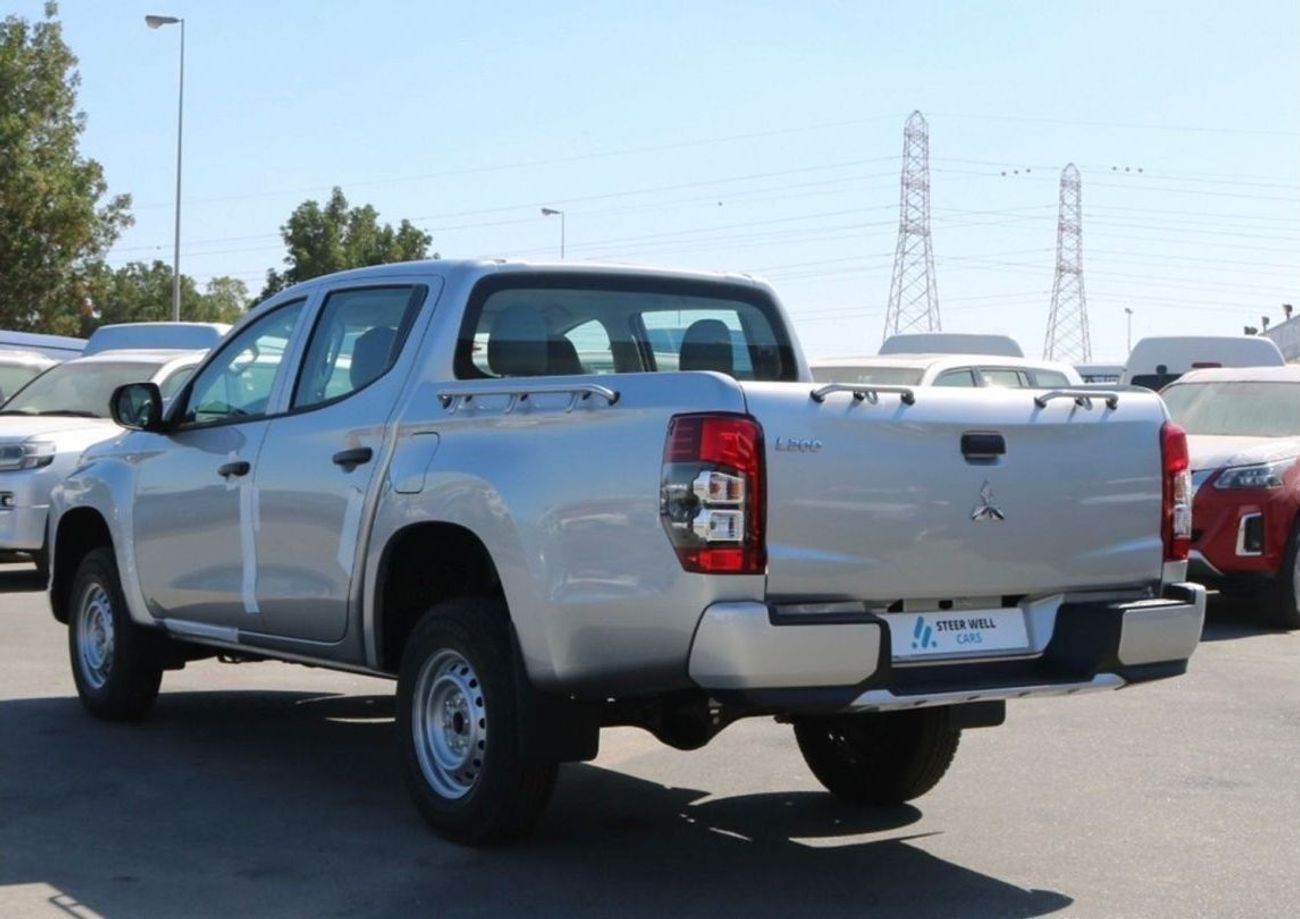 ميتسوبيشي L200 DIESEL - 2.4L -  DOUBLE CABIN - 4X4 - 5MT - POWER LOCKS AND POWER WINDOWS - EXPORT ONLY