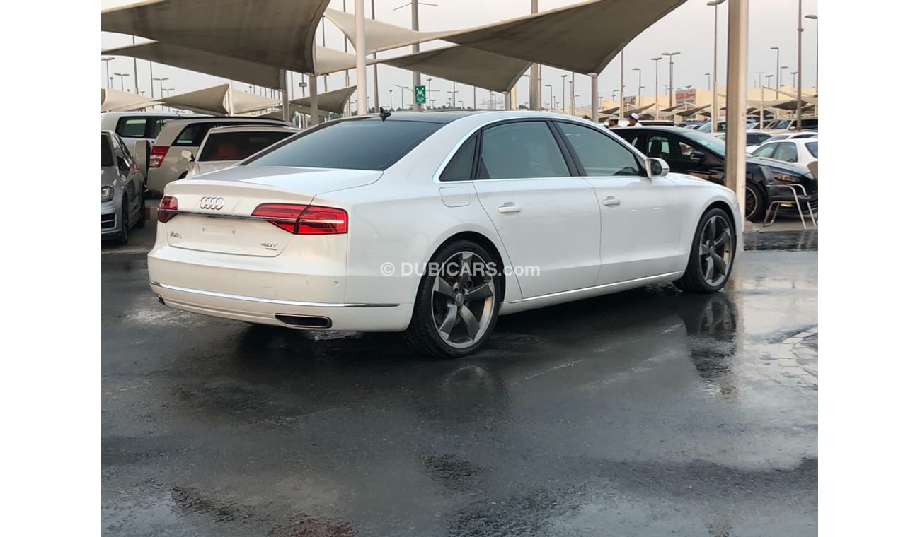 أودي A8 موديل 2015 خليجي فل مواصفات بانوراما ومثبت سرعه وتحكم كهربي كامل و5كاميرات وستاير وشاشات وطاولات خلف