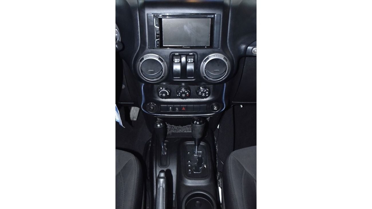 Jeep Wrangler EXCELLENT DEAL for our Jeep Wrangler Sport ( 2014 Model ) in White Color GCC Specs