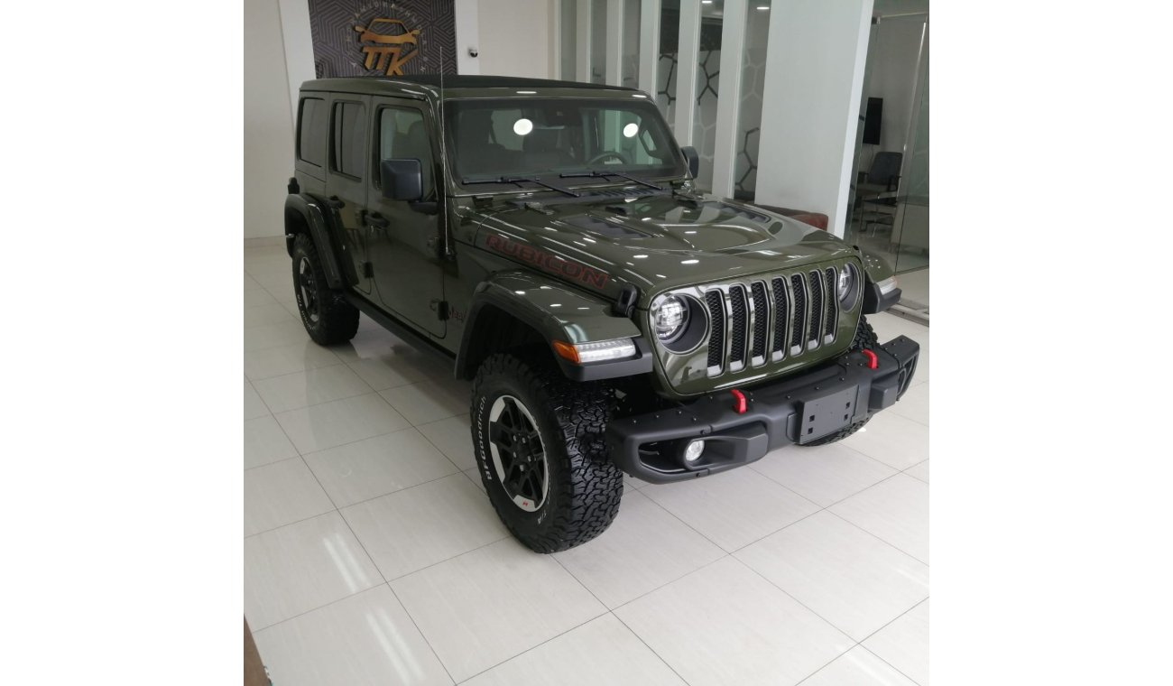 Used Rubicon JEEP WRANGLER RUBICON 2021 GREEN V4  L 14000 KM REAR  CAMERA BLACK LEATHER INTERIOR PAR 2021 for sale in Sharjah - 530200