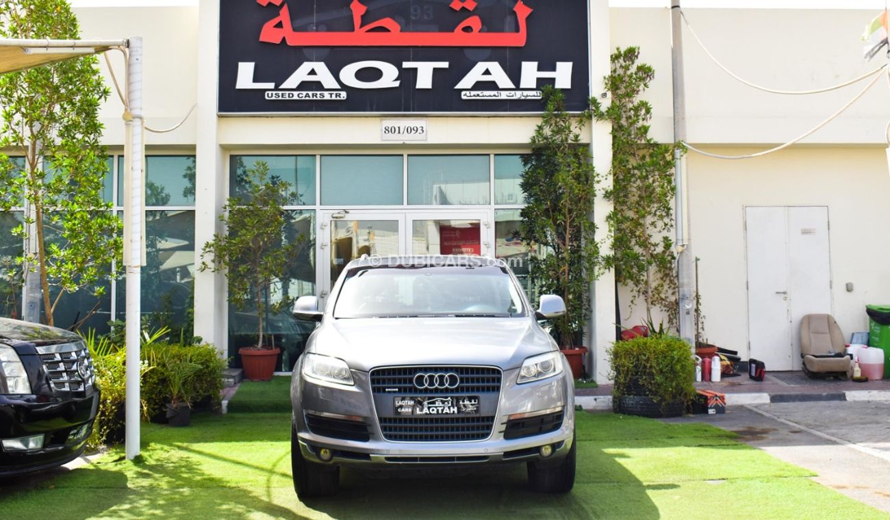 Audi Q7 2009 GCC model, silver color, saffron interior, leather panorama, cruise control, sensor wheels, in