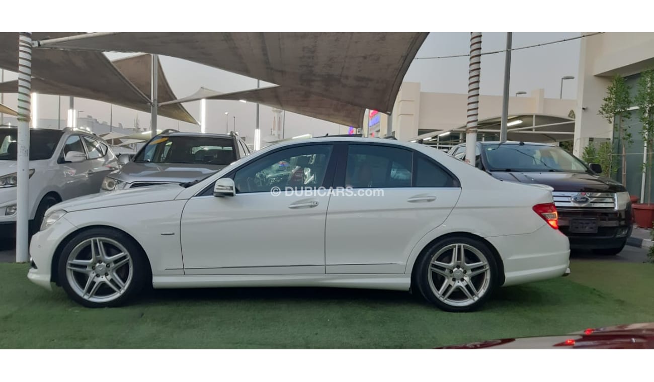 Mercedes Benz C350 Gulf panorama, full option, sensors, back wing, electric chair, white color wheels inside saffron, i