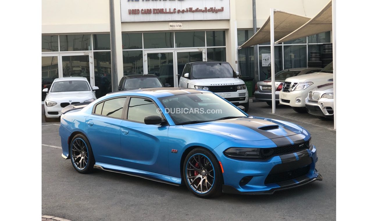 دودج تشارجر موديل 2015 خليجي فل مواصفات كراسي جلد ومثبت سرعه وتحكم كهربي كامل ونظام صوت ممتاز وكاميرا خلفيه