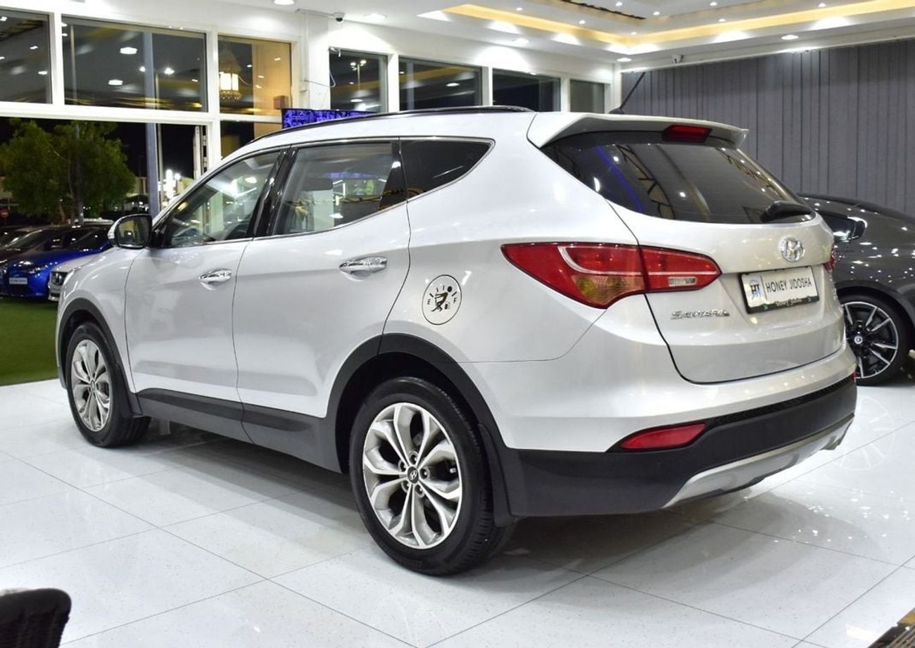 Hyundai Santa Fe EXCELLENT DEAL for our Hyundai SantaFe 4WD V6 ( 2016 Model ) in Silver Color GCC Specs