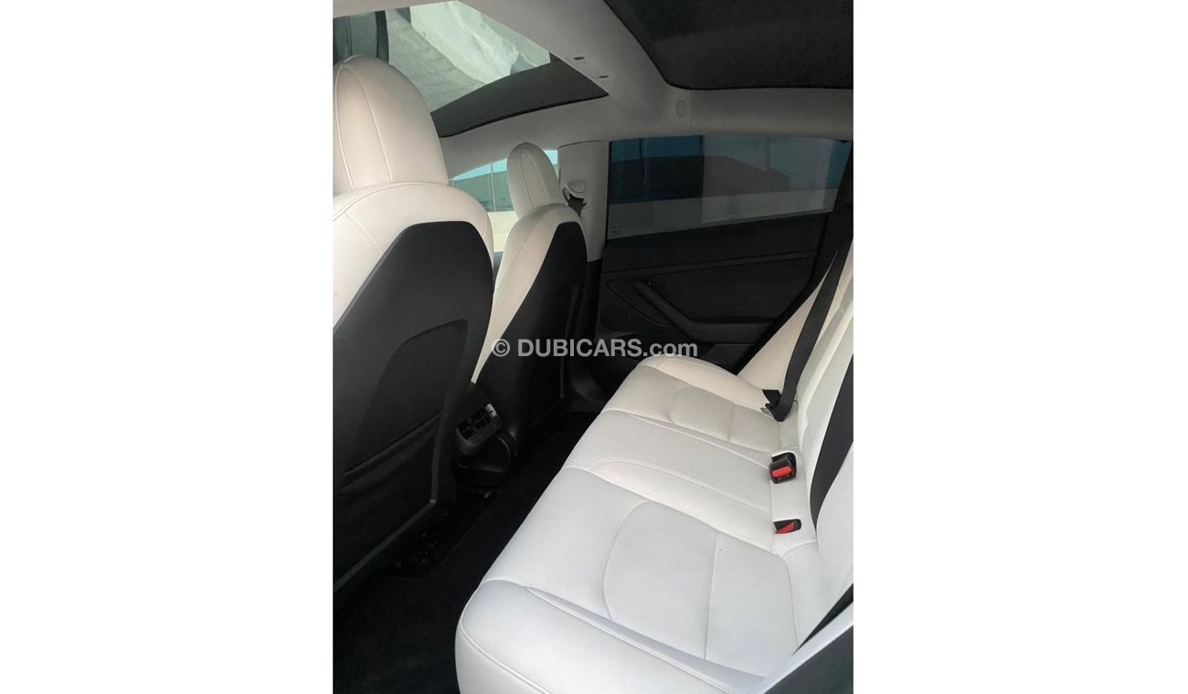 Tesla Model 3 Standard Plus ....….............................…..… Tesla Model 3 Standard Range Plus Model: 2021 W