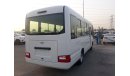 Toyota Coaster DIESEL 4.2L WITH AIR BAGS ABS AND POWER DOOR