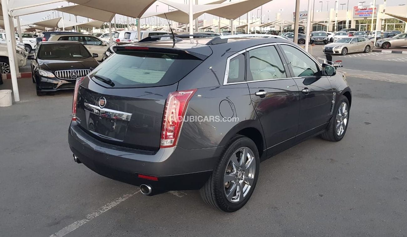 كاديلاك SRX موديل 2011 خليجي فل مواصفات كراسي جلد ومثبت سرعه وتحكم كهربي كامل ونظام صوت ممتاز وكاميرا خلفيه ومدخ