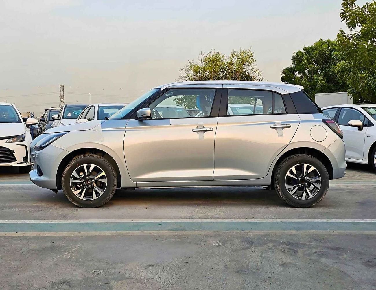 سوزوكي سويفت GLX || 1.2L PETROL A/T | PUSH START | REAR CAMERA | REAR PARKING SENSOR  (CODE # GLX)