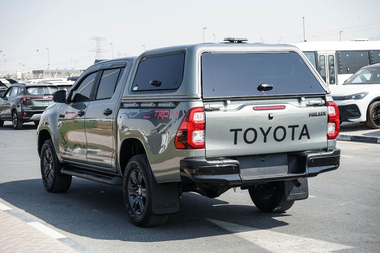 Toyota Hilux A Hilux canopy is a protective shell with a roof, walls, and windows that fits over the tray of a To
