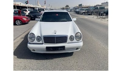 مرسيدس بنز E 320 موديل 1998 امريكي 6 سلندر كيت AMG 55 ابيض داخل بيج عداد الميل 198000