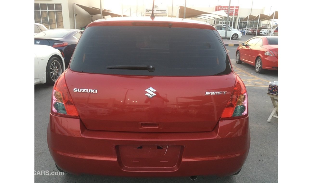 Suzuki Swift clean from the agency's first owner 2009 red color