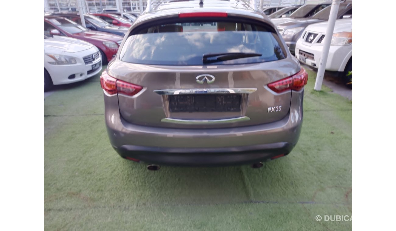 Infiniti FX35 Gulf model 2011 number one original paint, leather fingerprint slot, sensors, alloy wheels, and rear