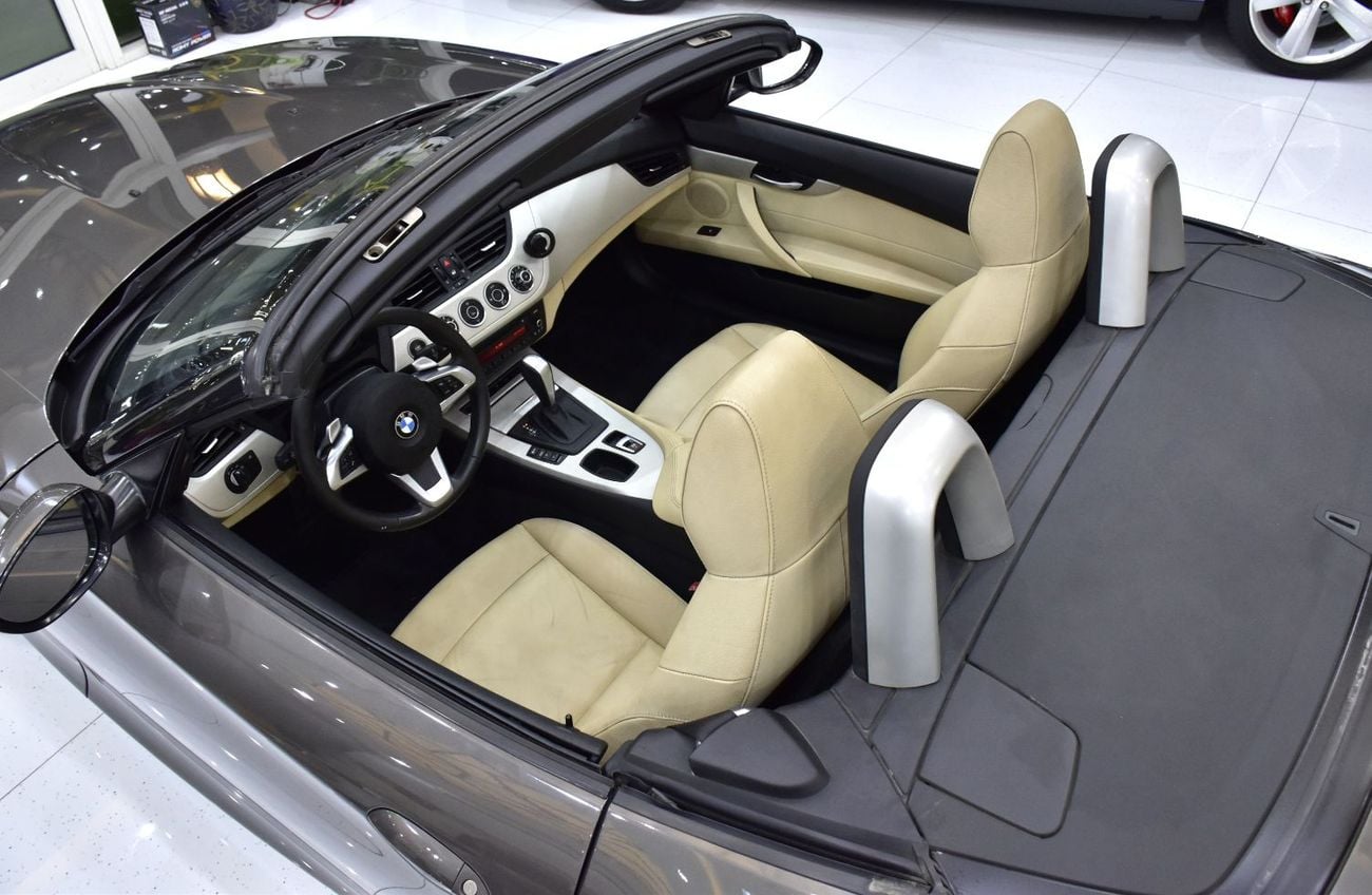 BMW Z4 sDrive 23i EXCLUSIVE EXCELLENT DEAL for our BMW Z4 sDrive23i ( 2012 Model ) in Brown Color GCC Specs
