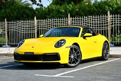 Porsche 911 CARRERA Cabriolet | Racing Yellow / Brown Roof | 379 HP | 989 KM | Warranty