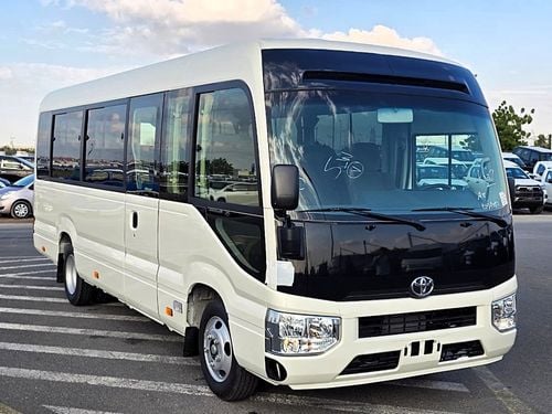 تويوتا كوستر vip 4.2l diesel M/T 22 seats with electric door and cool box