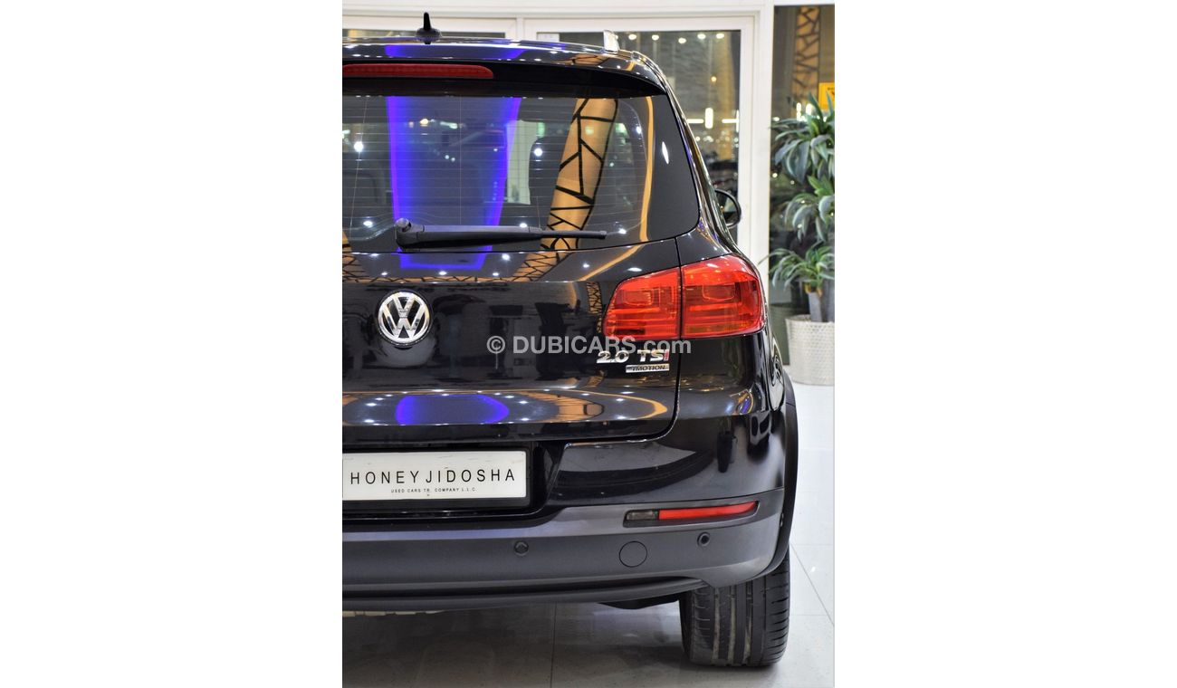 Volkswagen Tiguan SEL EXCELLENT DEAL for our Volkswagen Tiguan 2.0 TSi 4Motion ( 2014 Model! ) in Black Color! GCC Spe