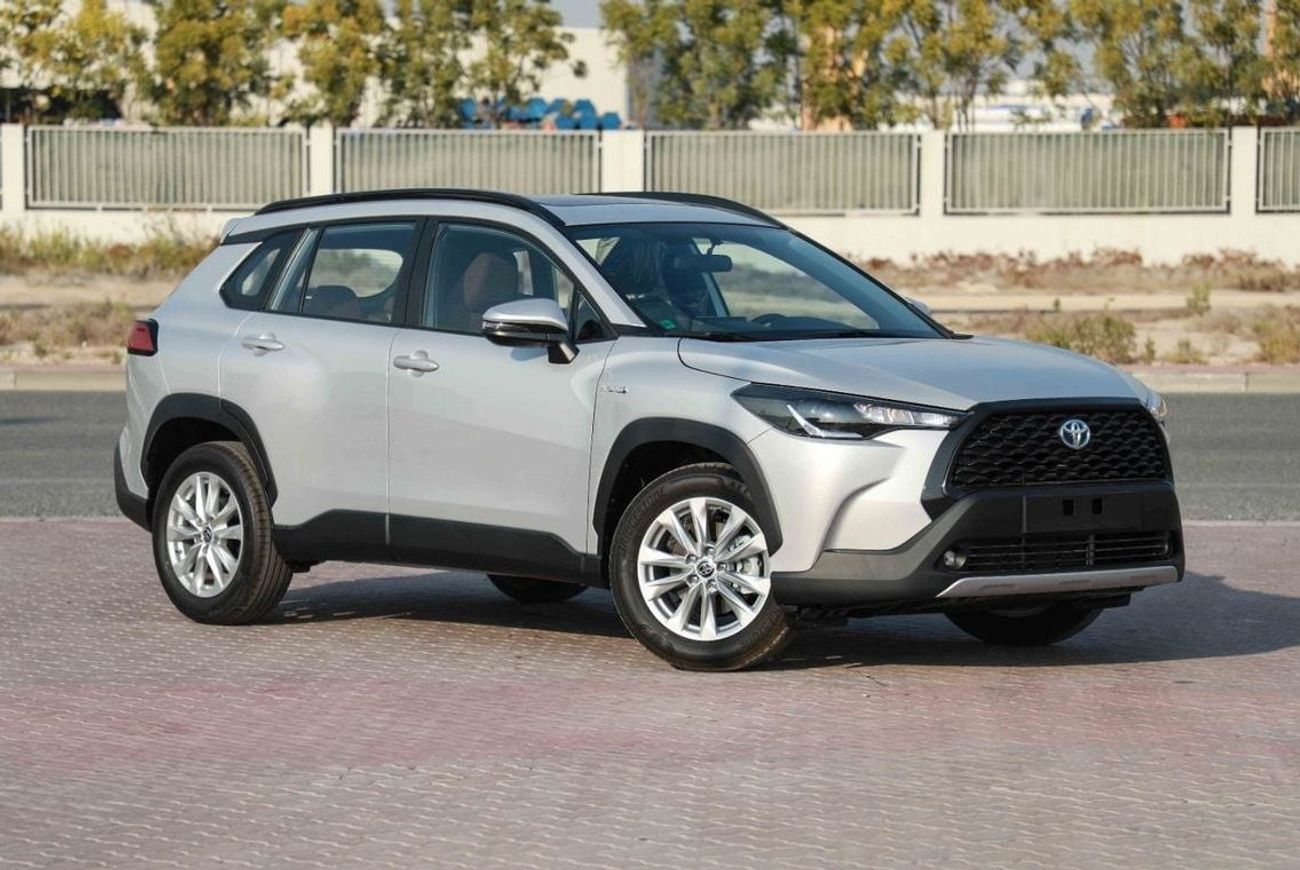 تويوتا كورولا كروس 2024 TOYOTA COROLLA CROSS 1.8 Hybrid MID - SILVER inside RED | Export Only