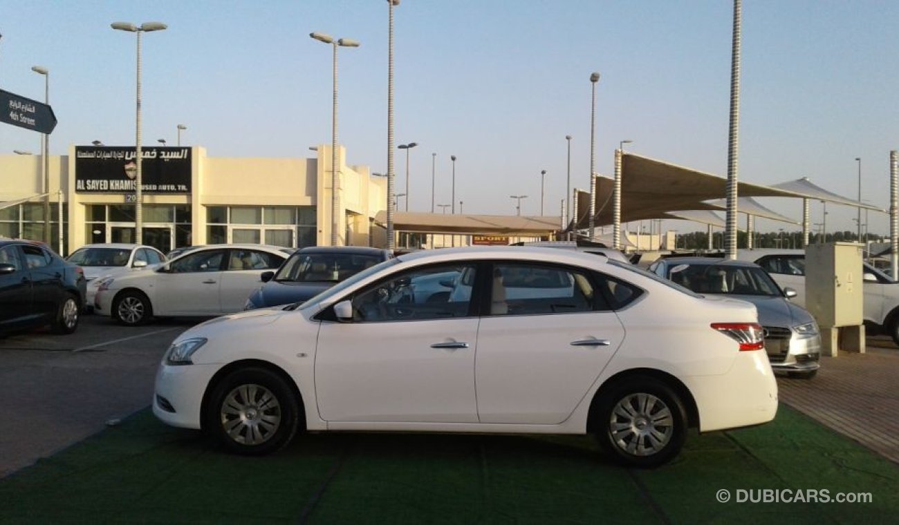 Nissan Sentra 2015 white 1.8 Gcc Excellent Condition without Accidents