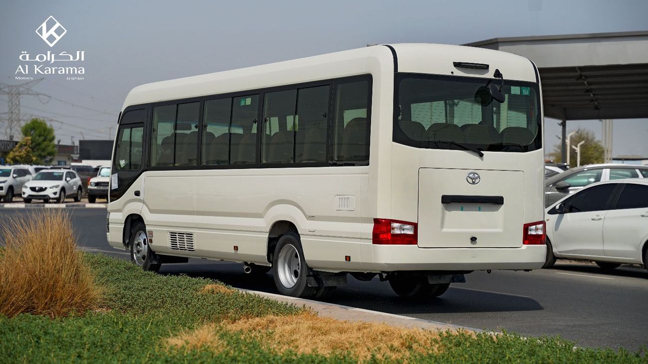 Toyota Coaster DLX - 4.2L Manual - 23 Seater Bus - Power Door - AC/Heater - Audio/AM/FM