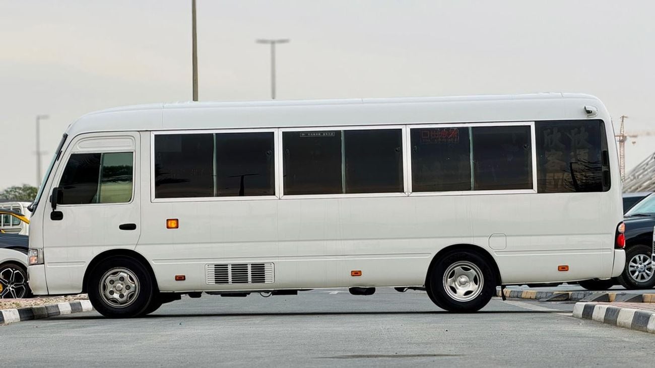 Toyota Coaster Fully luxury seats fully covered by cameras