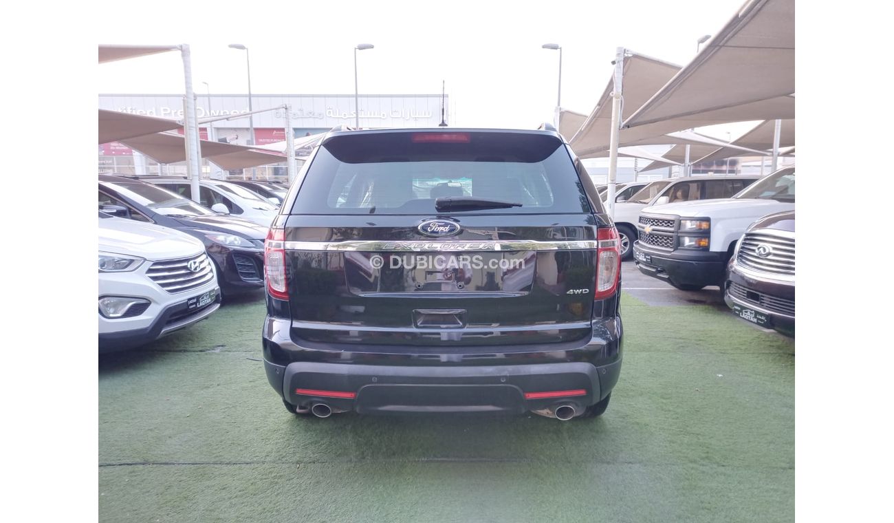Ford Explorer 2014 model, agency paint, cruise control, rims, and sensors in excellent condition