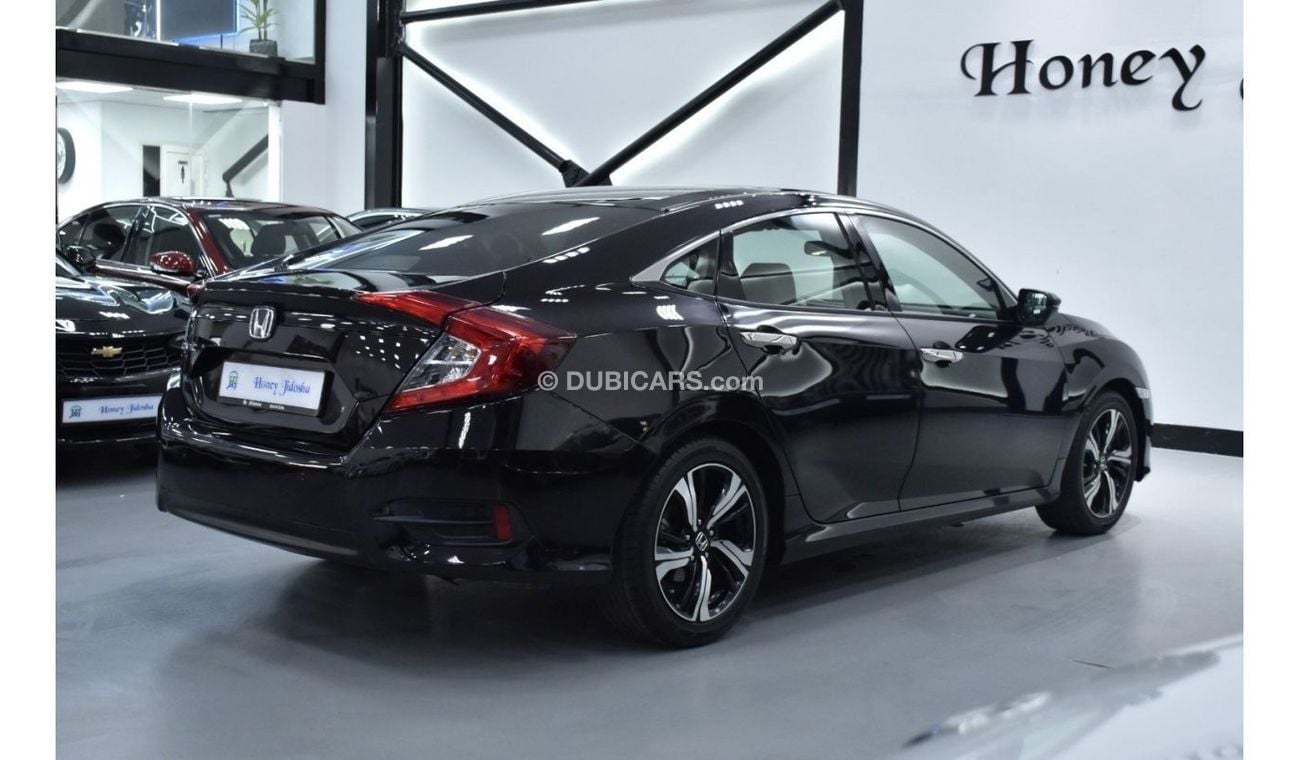 Honda Civic EXCELLENT DEAL for our Honda Civic ( 2019 Model ) in Dark Violet Color GCC Specs