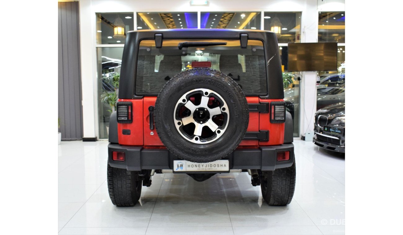 Jeep Wrangler Sport EXCELLENT DEAL for our Jeep Wrangler Sport ( 2015 Model! ) in Red Color! GCC Specs