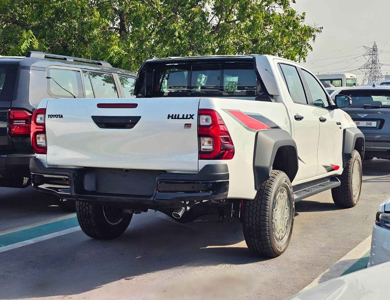 تويوتا هيلوكس GR SPORT WIDE BODY / 4.0L PETROL V6 / OVER FENDER / TRIP TRONIC / 360*CAMERA / DRIVER PWR SEATS WITH