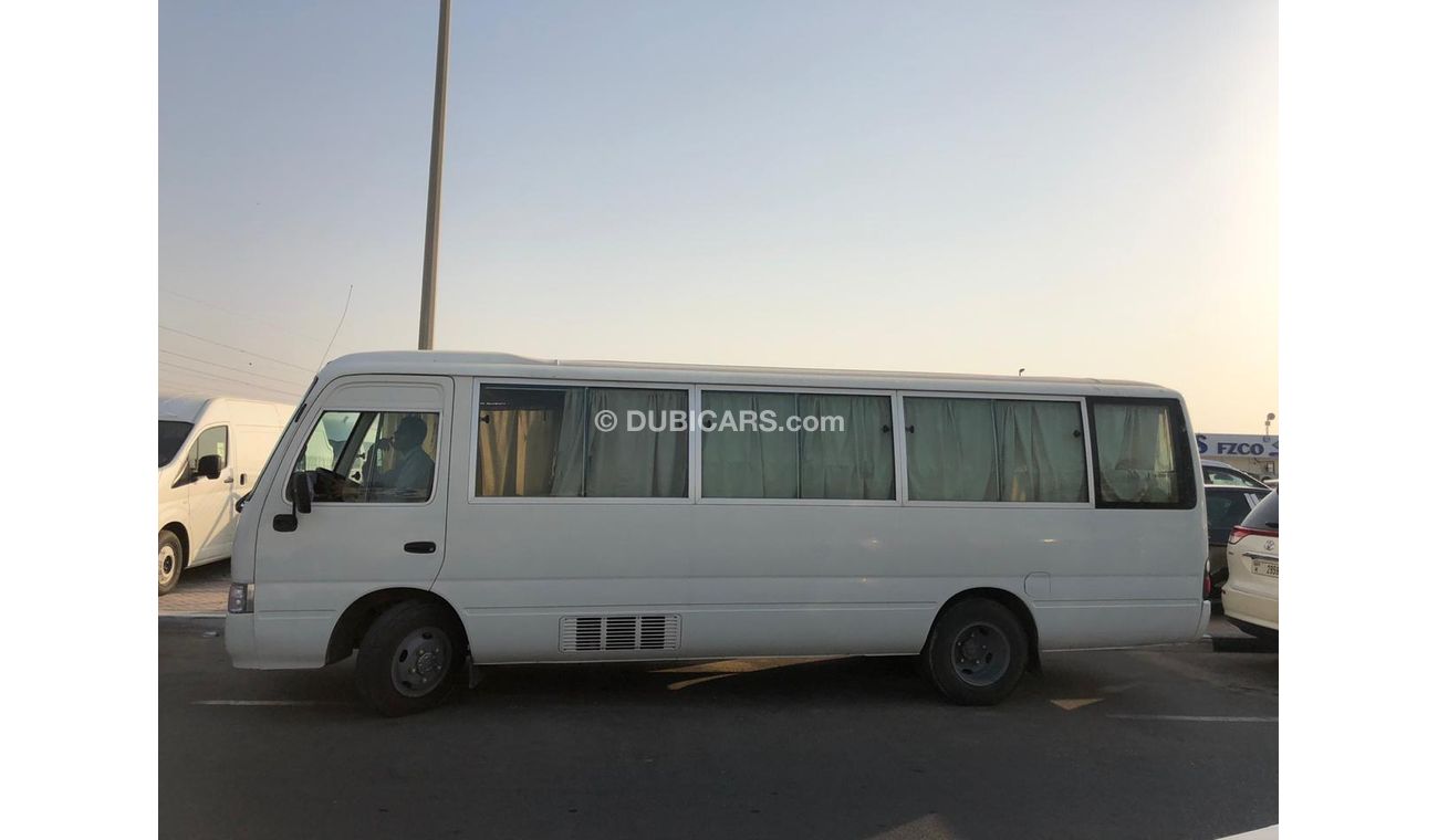 Toyota Coaster 4.2L Diesel, Automatic Door, Clean Interior and Exterior, SPÉCIALEMENT POUR LE CONGO, LOT-TCW05