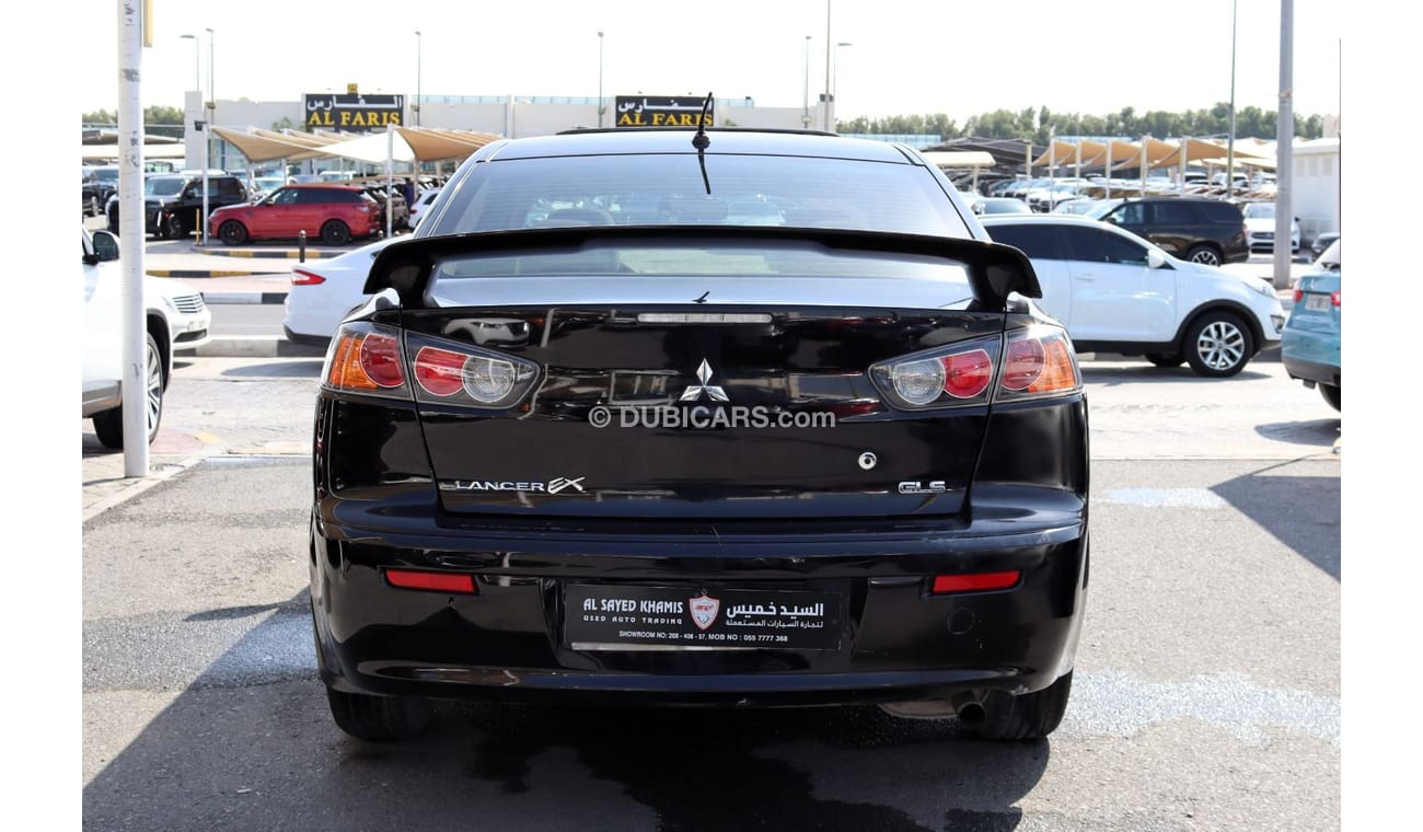 ميتسوبيشي لانسر GLS هاي خالية من الحوادث - خليجي - مكينة 2000 سي سي - رقم واحد - السيارة بحالة ممتازة من الداخل والخ