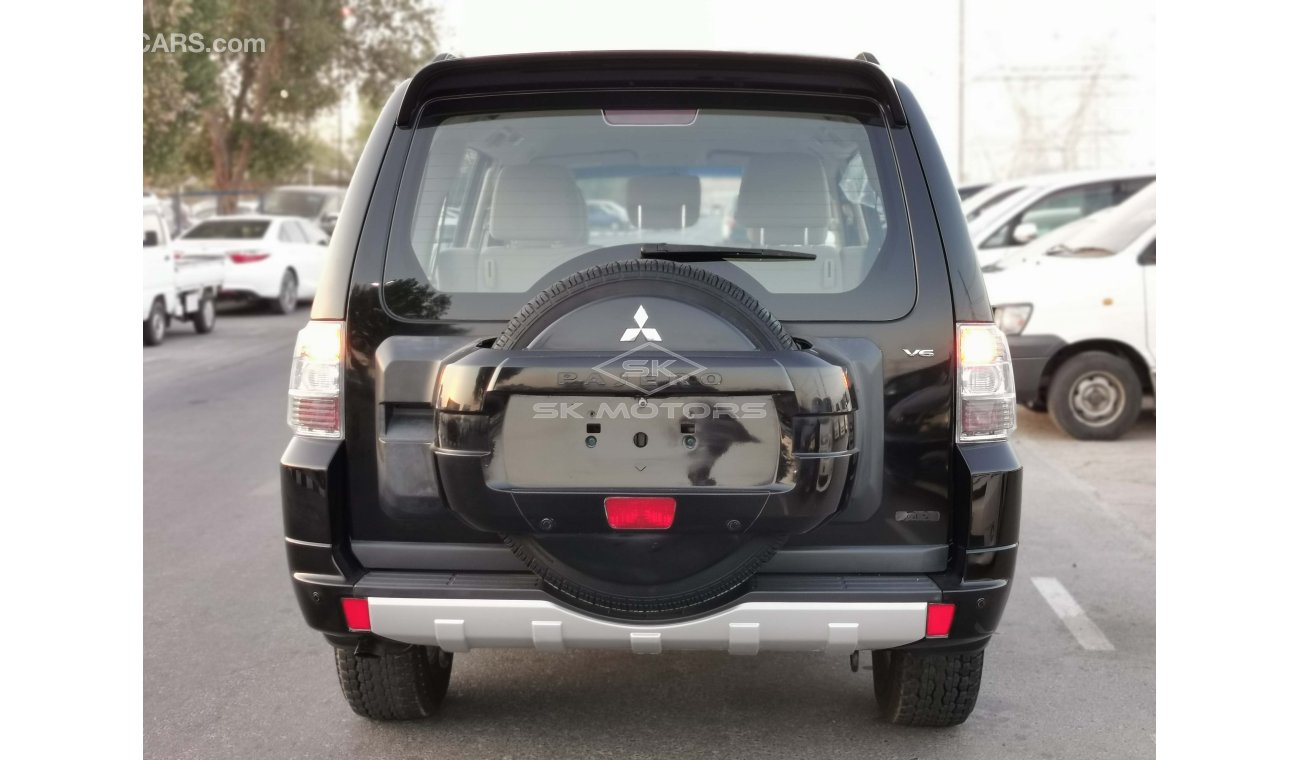 ميتسوبيشي باجيرو 3.5L, 16" Rims, Rear Parking Sensor, Front and Rear A/C, Fabric Seats, DVD, 4WD, AUX-USB (LOT # 863)