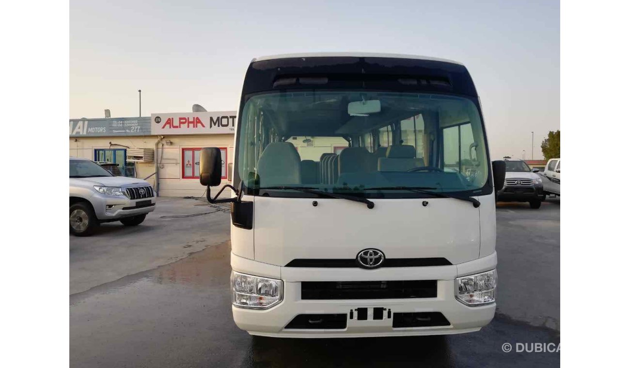 Toyota Coaster 23 seats High Roof Diesel full Option