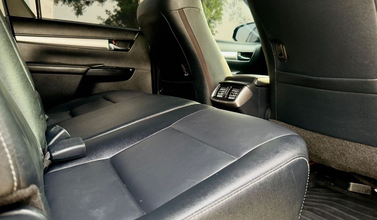 تويوتا هيلوكس MODIFIED TO GR SPORTS | 2.8L DIESEL ENGINE | RHD (AT) | 2021 | ELECTRIC SEAT | 4WD | PREMIUM BLACK I