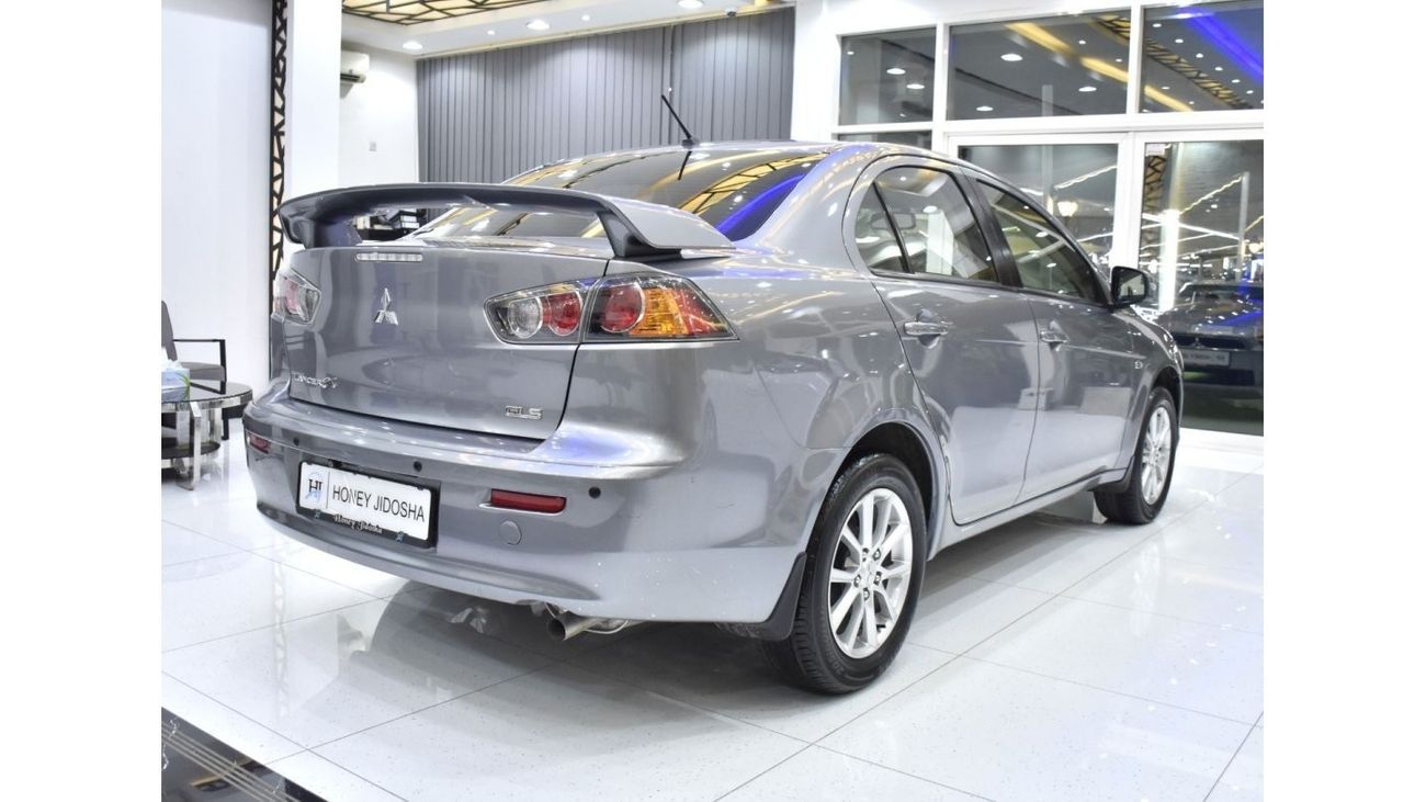 Mitsubishi Lancer EXCELLENT DEAL for our Mitsubishi Lancer GLS ( 2016 Model ) in Silver Color GCC Specs