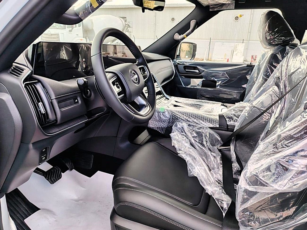 نيسان باترول Nissan Patrol SE T2 3.8l petrol 4WD Gcc White inside black Color 2026 model