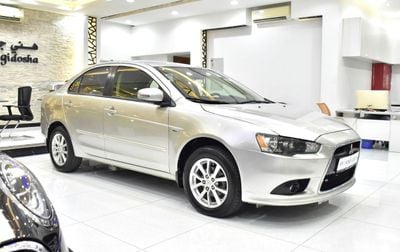 Mitsubishi Lancer EX EXCELLENT DEAL for our Mitsubishi Lancer EX ( 2015 Model ) in Beige / Silver Color GCC Specs