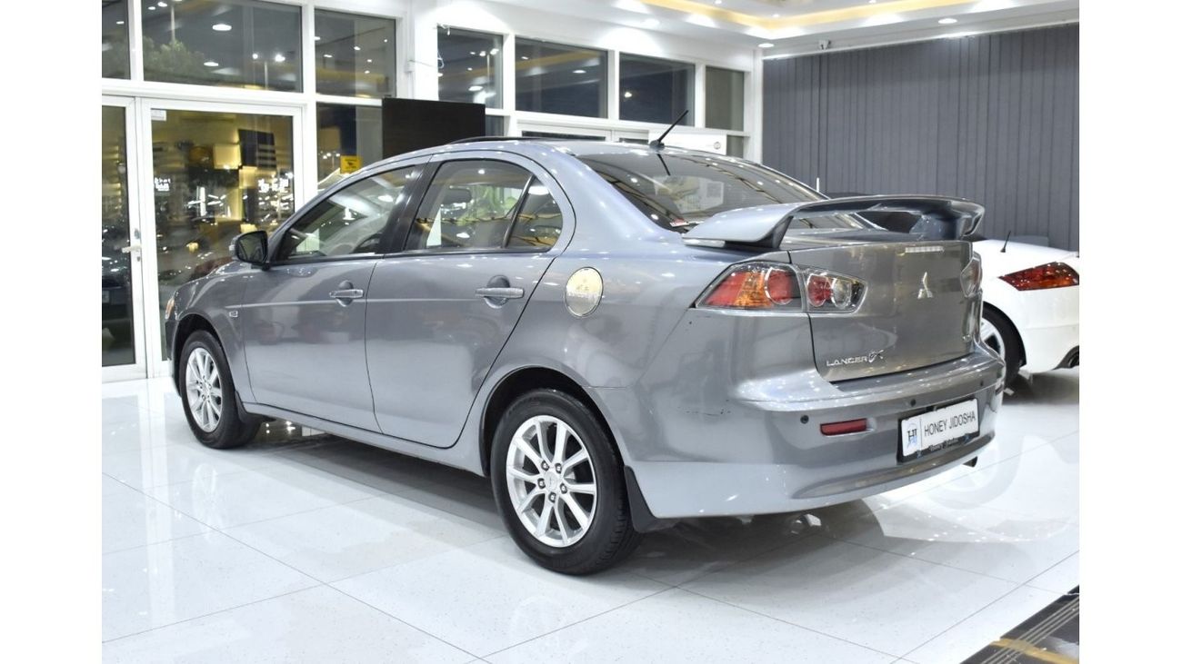 Mitsubishi Lancer EXCELLENT DEAL for our Mitsubishi Lancer GLS ( 2016 Model ) in Silver Color GCC Specs