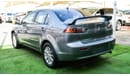 Mitsubishi Lancer Gulf gray color inside beige without accidents Rings rear wing sensors fog lights in excellent condi