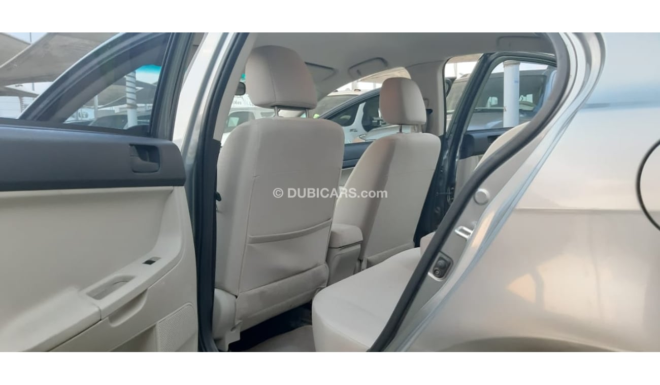 Mitsubishi Lancer Gulf gray color, inside beige without accidents, rear wing sensors, fog lights, in excellent conditi